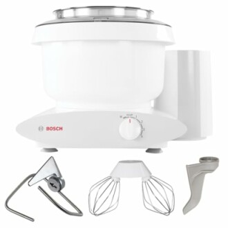 Bosch stand mixer with attachments including dough hook, wire whisks, and scraper, ideal for baking.