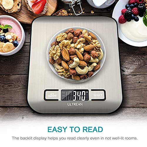 Digital kitchen scale displaying a bowl of mixed nuts.
