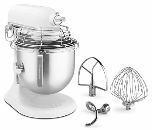White stand mixer with three attachments: paddle, whisk, and dough hook.