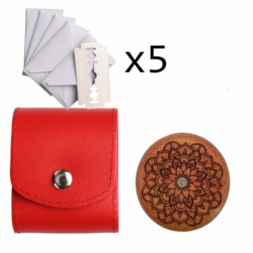 Red leather case, wooden item with floral design, and five razors.