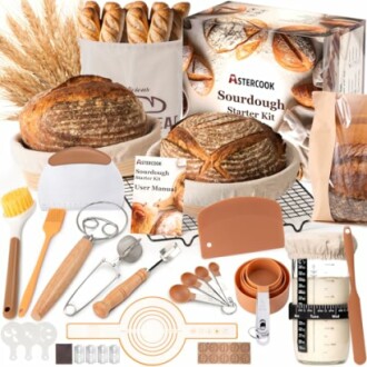 Sourdough starter kit with bread, tools, and ingredients.